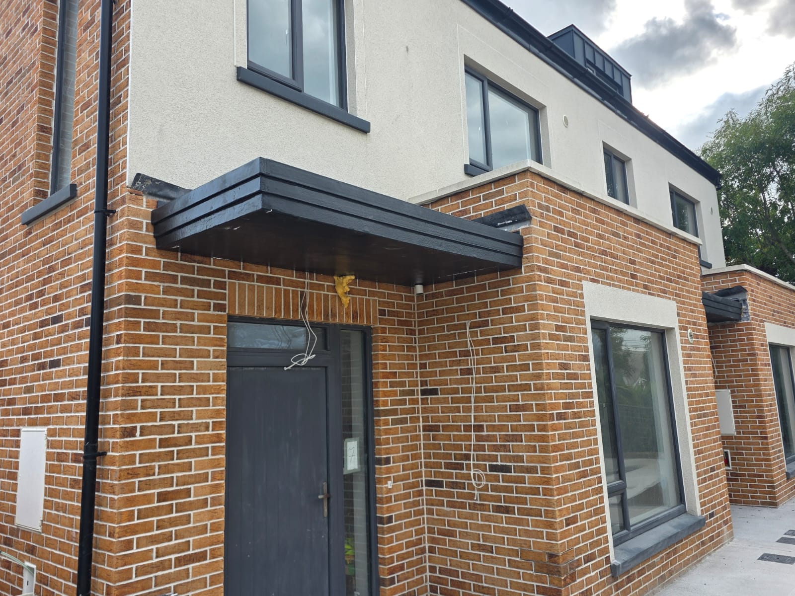 ML8 Canopy polyurea door canopy installation 3