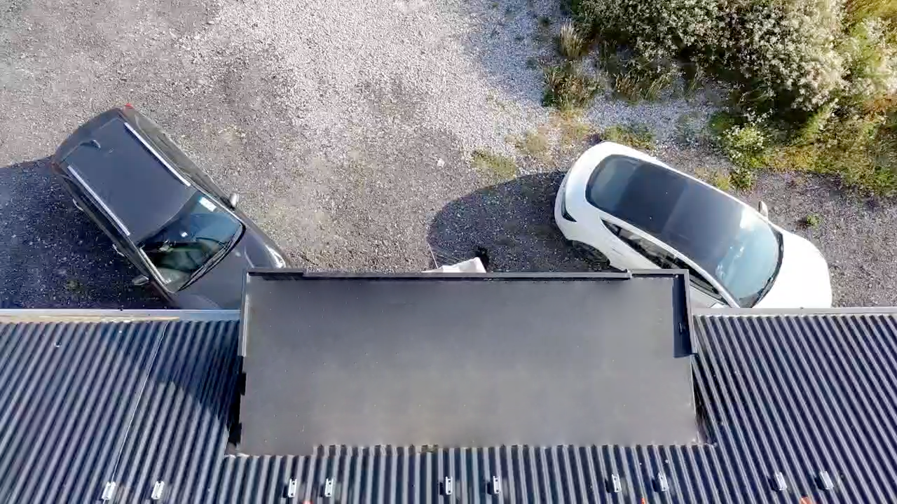 Top-down aerial view of a flat-topped bay integrated with lightweight roof